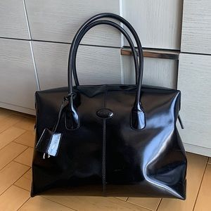 Tod’s - black patent leather Diana Bag